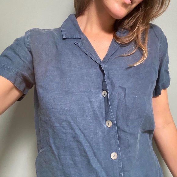Blue linen shirt with a collared neckline, short sleeves, and button up front. - Picture 2 of 3